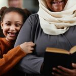 Grandmother with granddaughter visiting to church