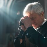 Priest praying in the church